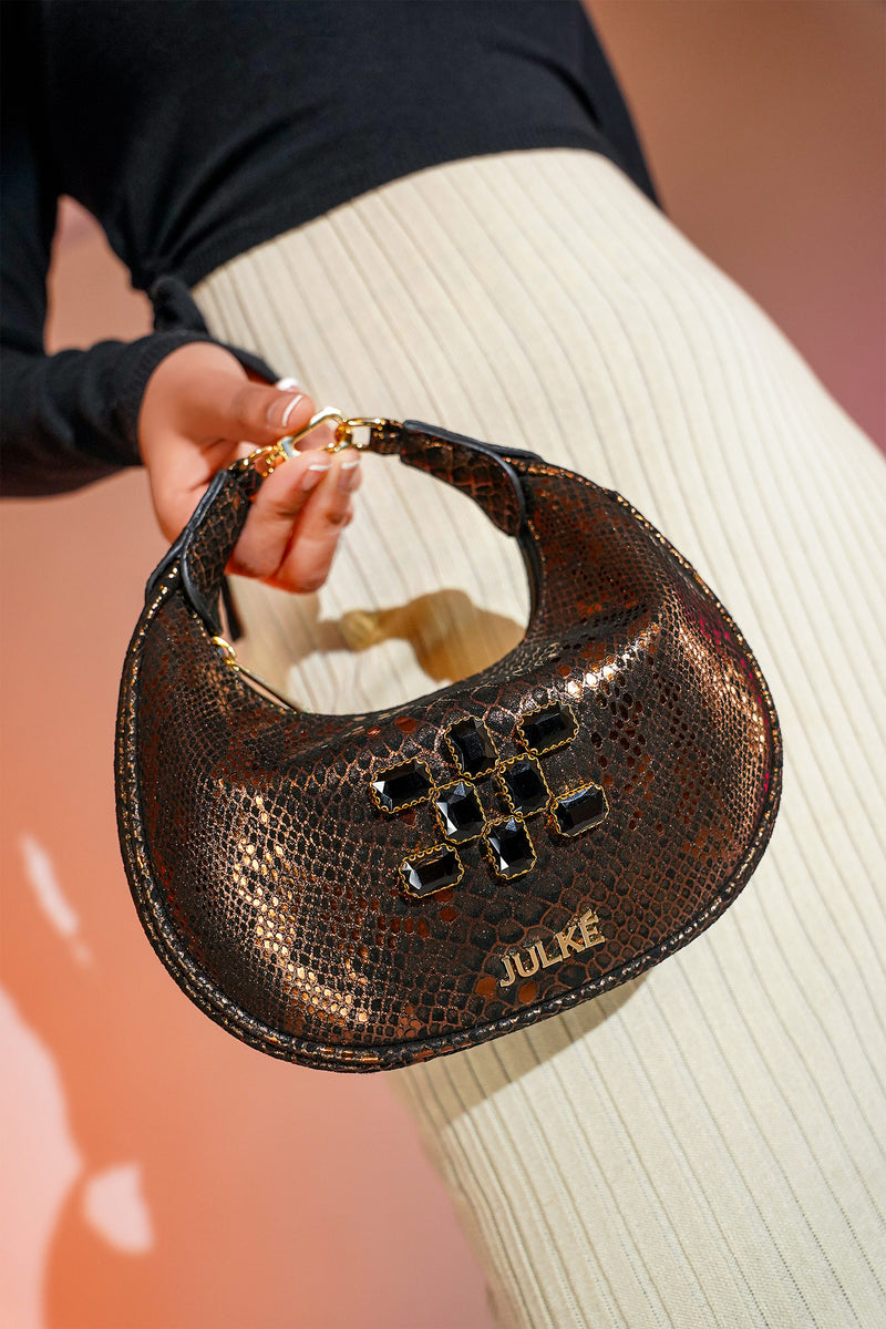 Women's leather mini hobo bag in copper black colour with 3d reptile texture and unique clip-on handle by JULKE 