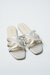 Womens leather flats in off white colour with laser cut strap by JULKE 