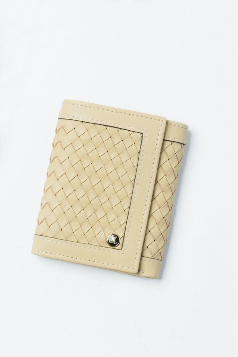 Womens leather trifold wallet in light yellow colour with braiding and metal logo by JULKE