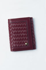 Womens leather trifold wallet in maroon colour with braiding and metal logo by JULKE