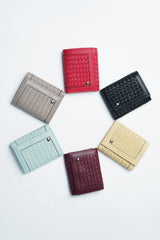 Womens leather trifold wallet in 6 colours with braiding and metal logo by JULKE