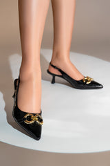 Women's sling-back pointed toe heels in black colour with glossy reptile texture and gold double circle  buckle by JULKE