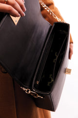 Womens leather shoulder bag in beige and  black colour with quilted straps and gold chain by JULKE