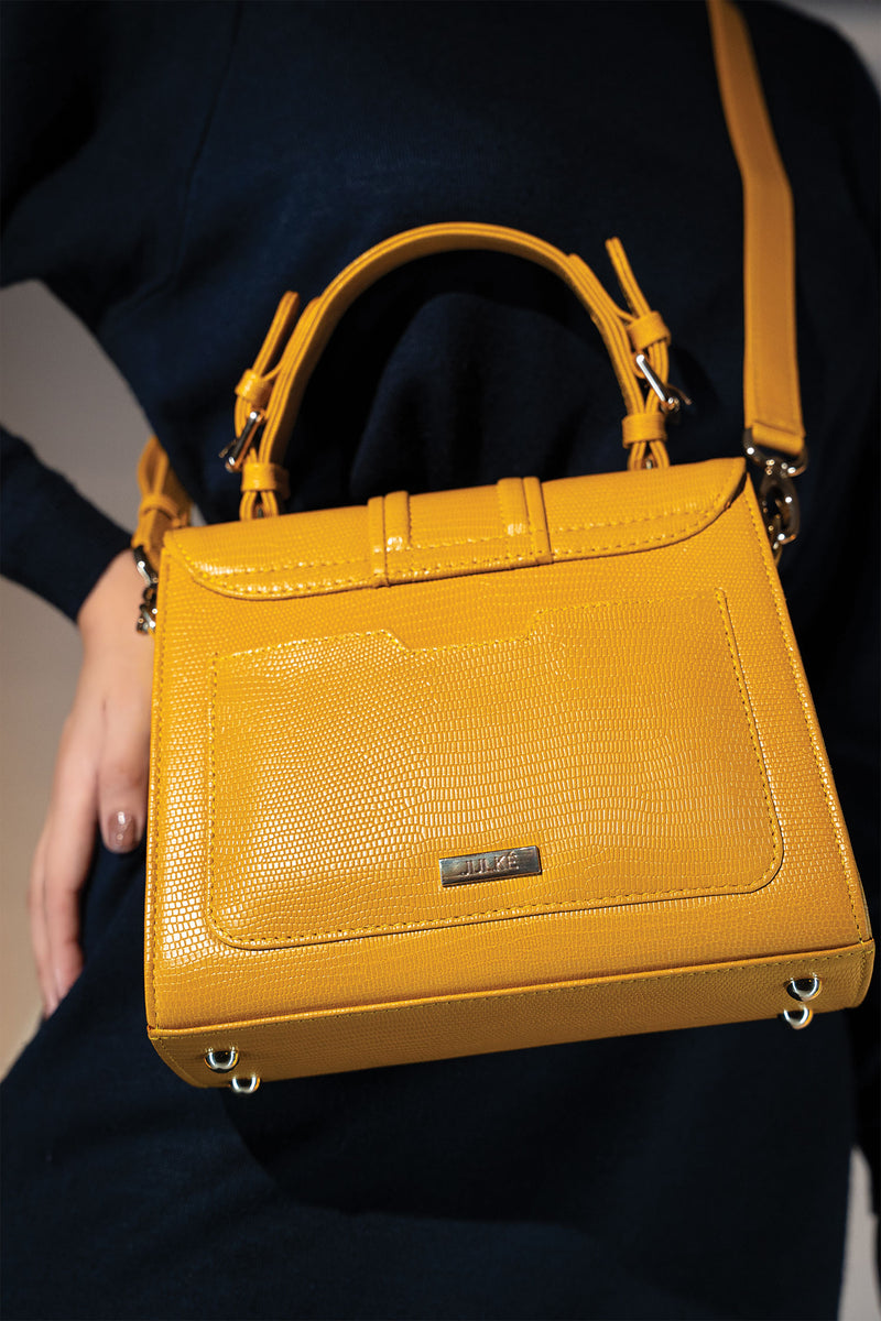 Womens leather top handle bag in yellow colour with reptile texture and detachable shoulder strap by JULKE