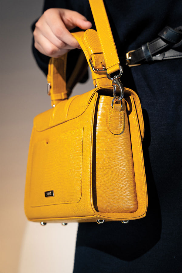 Womens leather top handle bag in yellow colour with reptile texture and detachable shoulder strap by JULKE