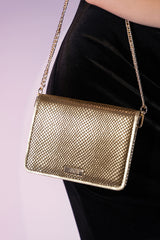 Women's leather reptile texture shoulder clutch bag in gold colour with rhinestones and detachable golden shoulder chain by JULKE. 