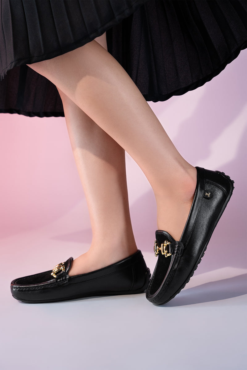 Womens leather and suede moccasins in black colour with gold metallic horse-bit buckle and moc stitch toe By JULKE