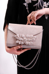 Womens leather shoulder clutch bag in light pink colour with diamante leaf brooch and silver chain by JULKE