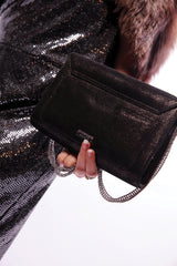 Womens leather shoulder clutch bag in shiny black colour with diamante leaf brooch and silver chain by JULKE