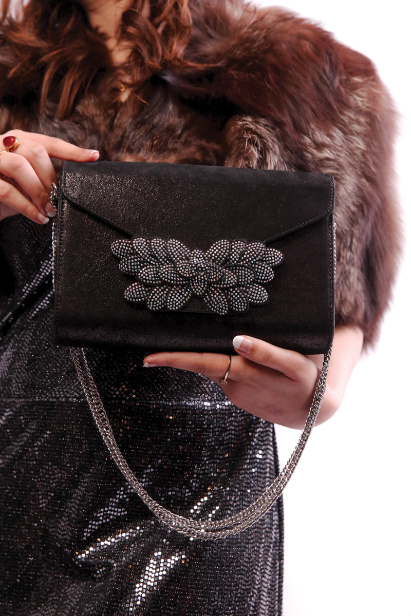 Womens leather shoulder clutch bag in shiny black colour with diamante leaf brooch and silver chain by JULKE