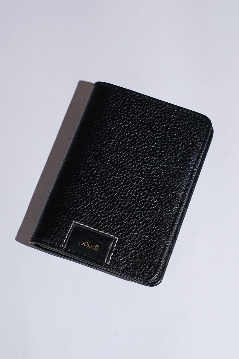 Mens leather bifold passport wallet in black colour with croc texture and contrast stitching by JULKE