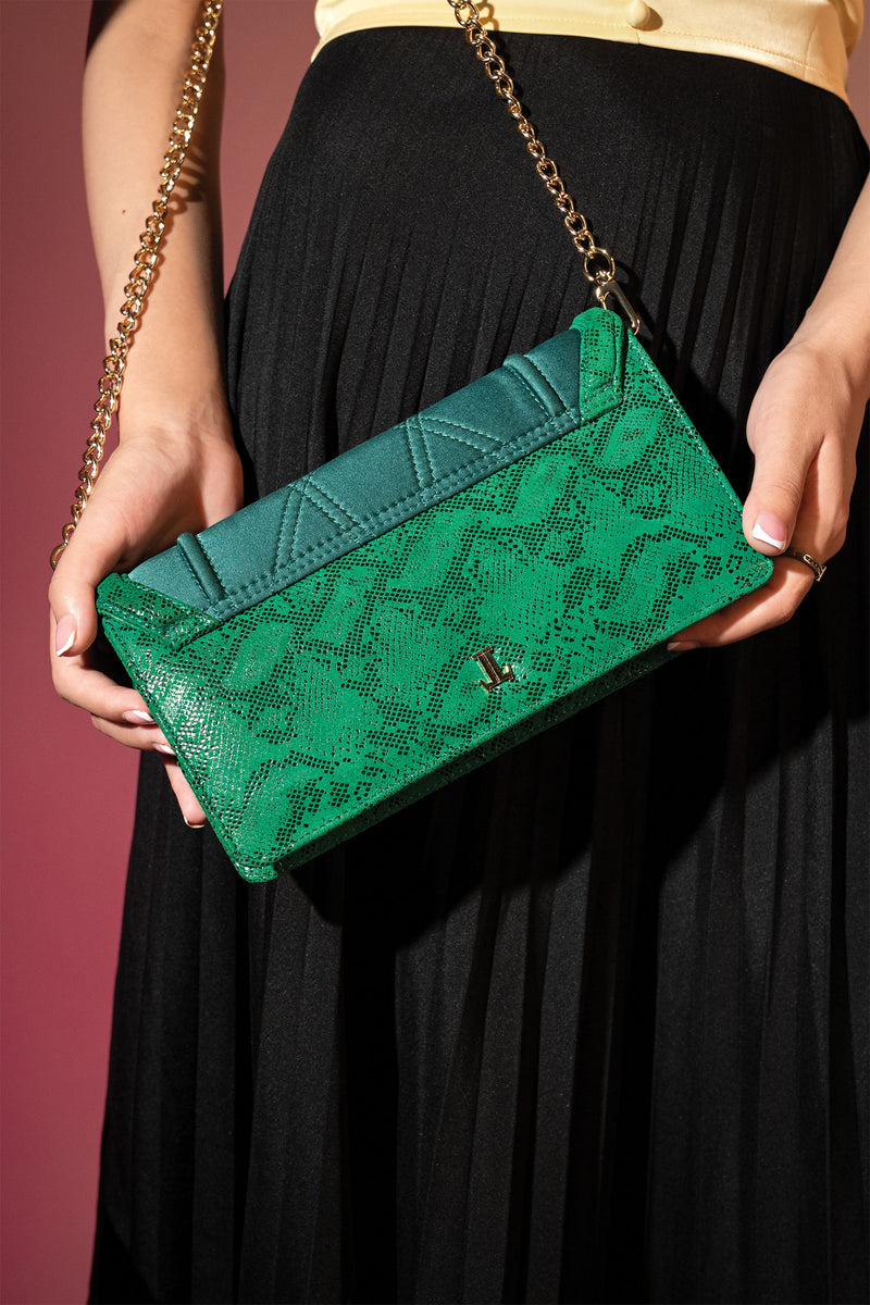 Womens suede leather envelope clutch in green colour with reptile print and detachable golden shoulder chain by JULKE