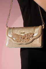 Womens suede leather envelope clutch in pale gold colour with shiny foil and detachable golden shoulder chain by JULKE