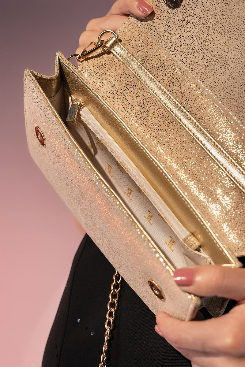 Womens suede leather envelope clutch in pale gold colour with shiny foil and detachable golden shoulder chain by JULKE