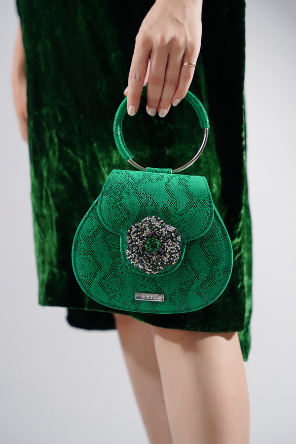 Womens leather bag in green colour with snake print by JULKE