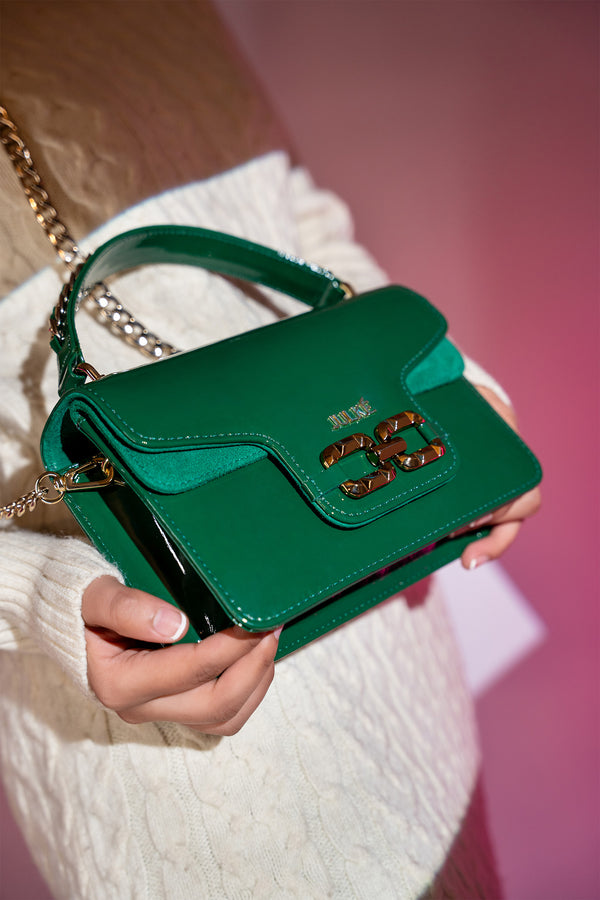 Women's leather top handle shoulder bag in green coloured patent and suede with golden chain and buckle brooch by JULKE